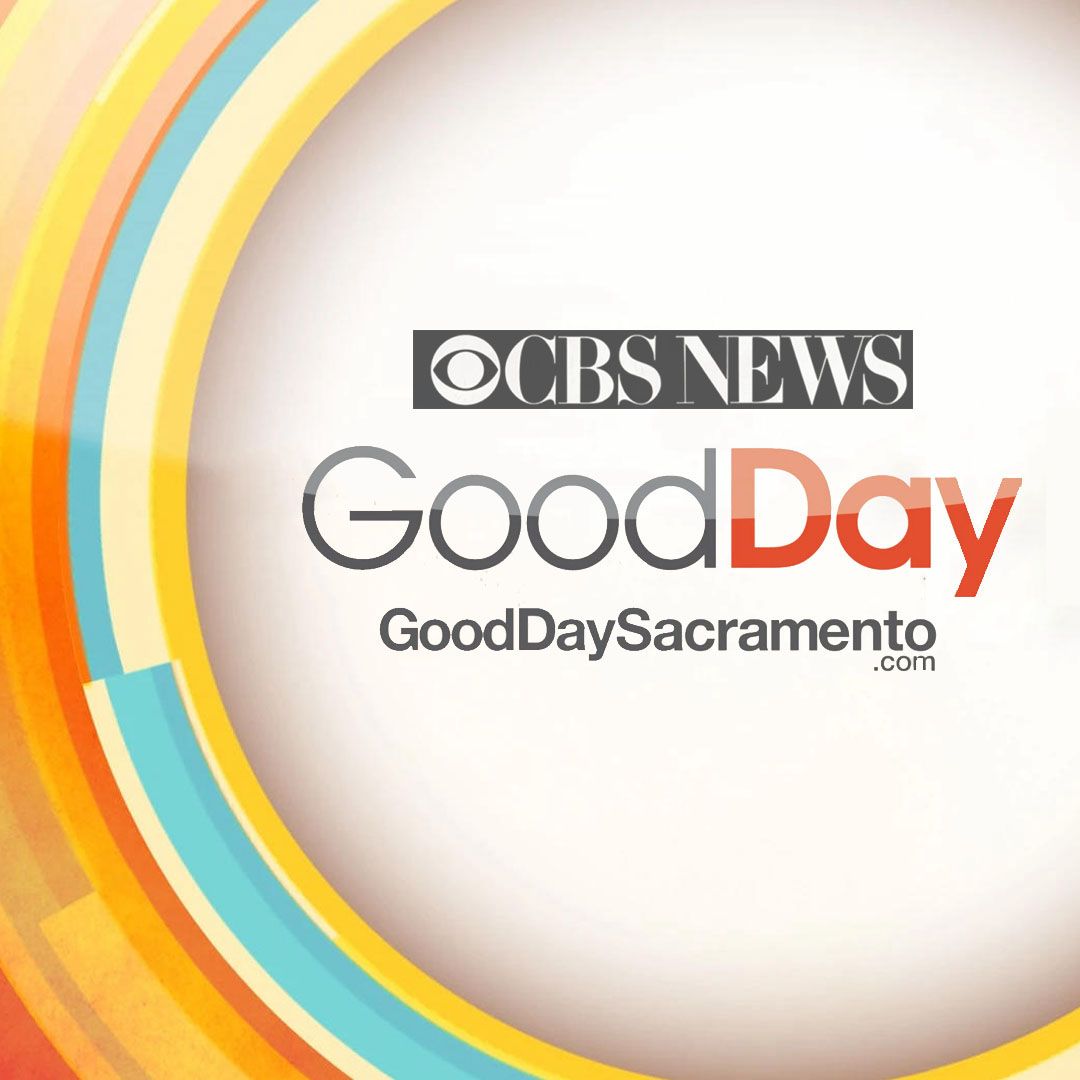 CBS News Good Day Sacramento logo on a colorful circular graphic background.