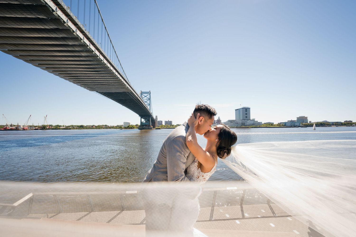 philly race street pier couples kissing dramatic wedding photo