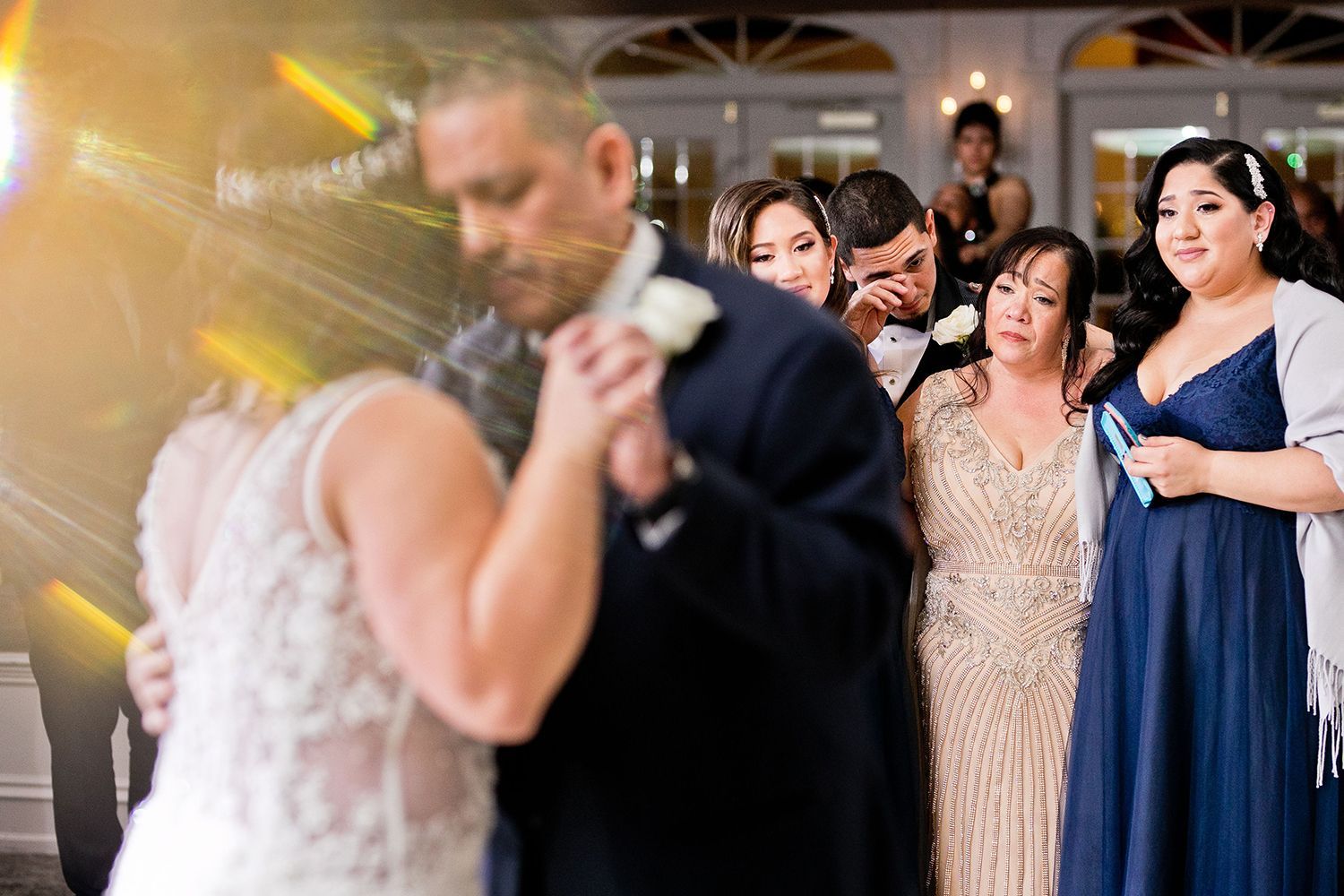 epic photographer capturing emotional wedding photos