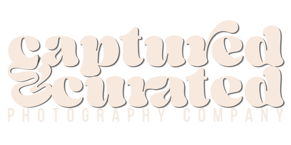 Captured and Curated Photography Company logo in elegant retro serif typography on light background.