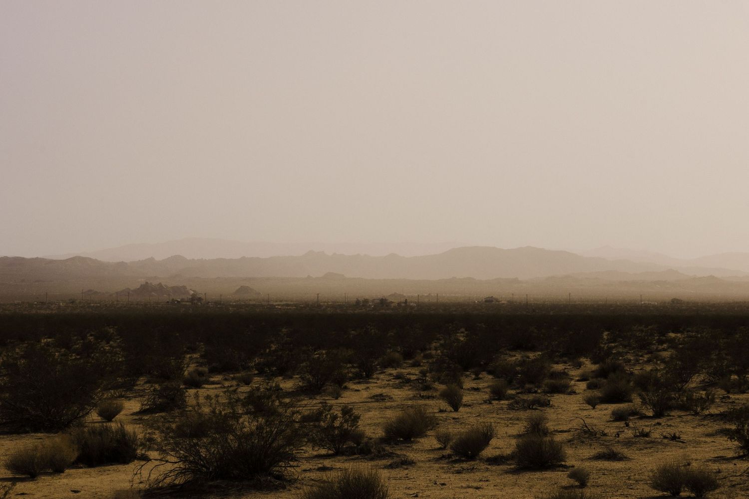 A wide desert photo, documentary commercial sunset moody hills travel