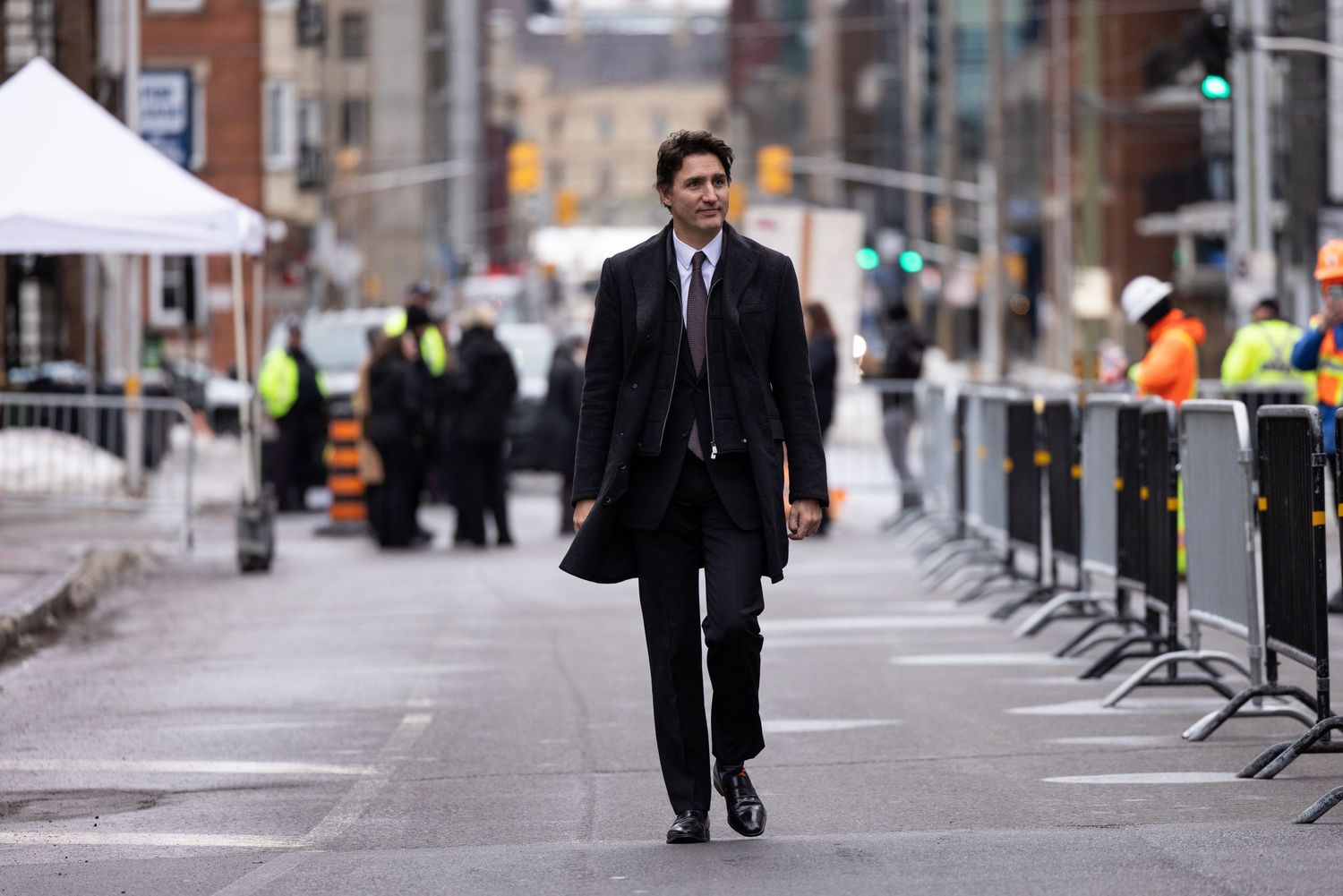Prime Minister Justin Trudeau walks down the street, political documentary photography