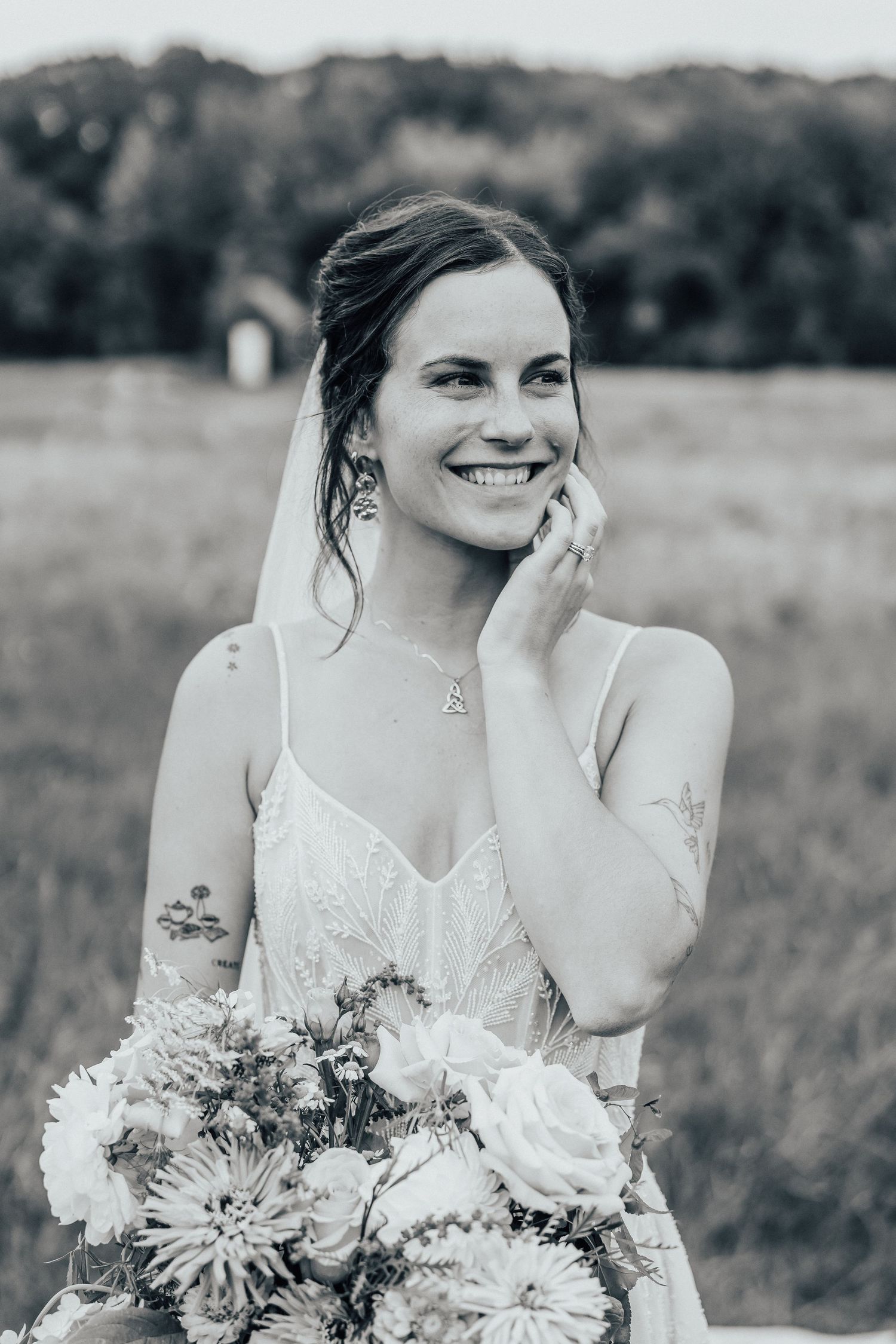 Black and white portrait series showing joyful expressions and floral bouquet.