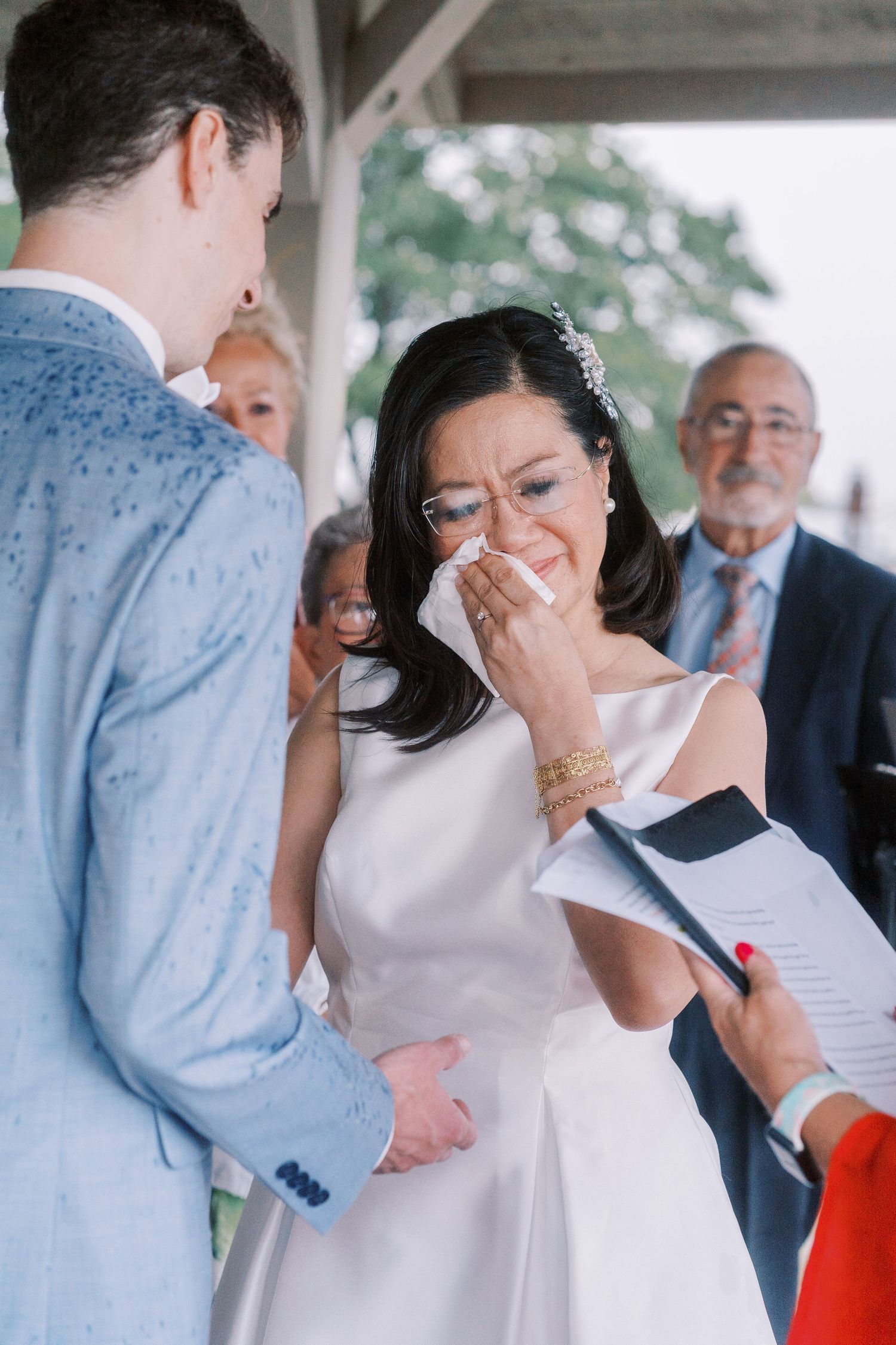 Emotional reaction sequence showing touching moments during a wedding ceremony.