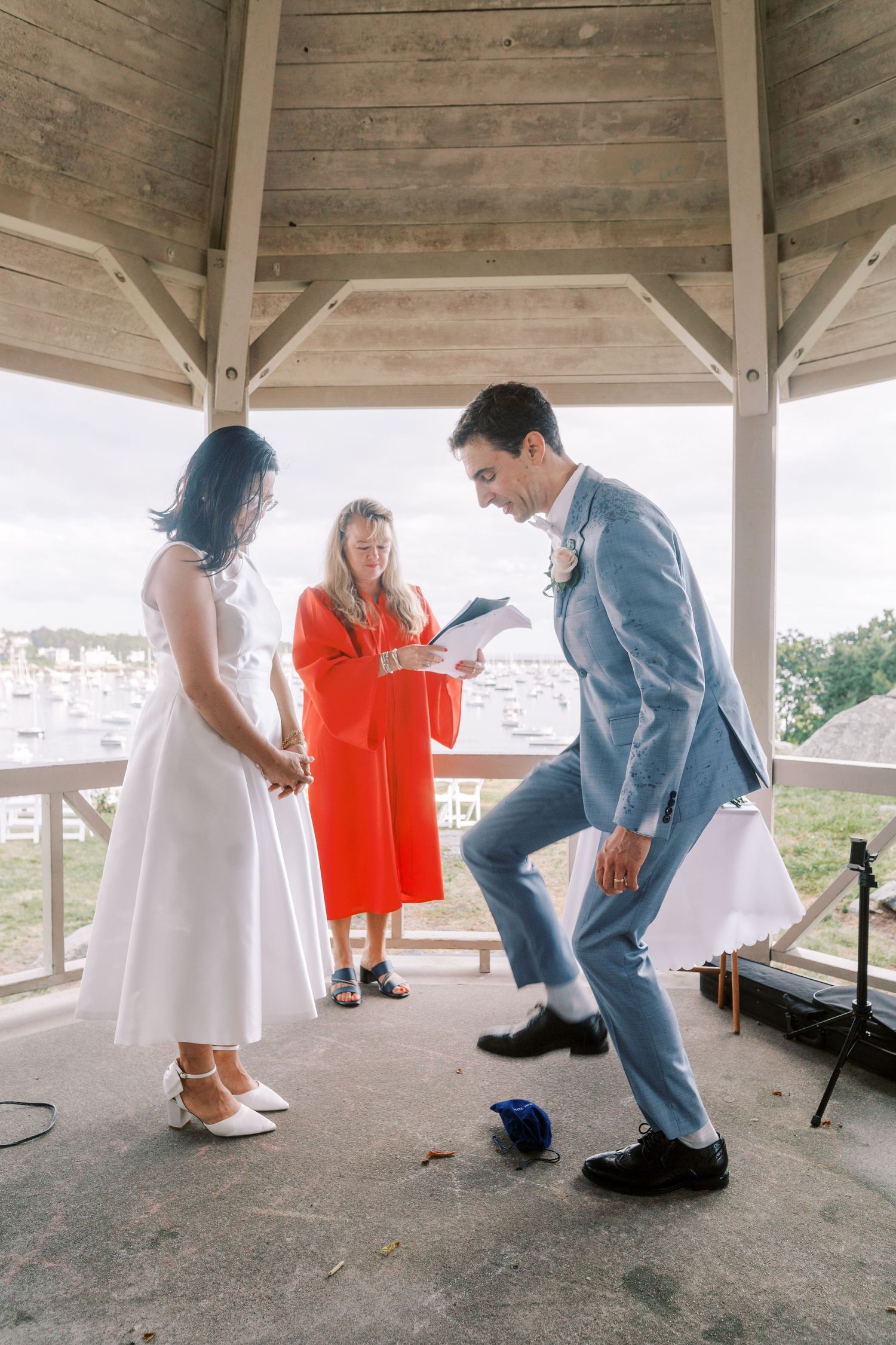 A series of five photos showing people in formal wear interacting in a covered outdoor gazebo area.