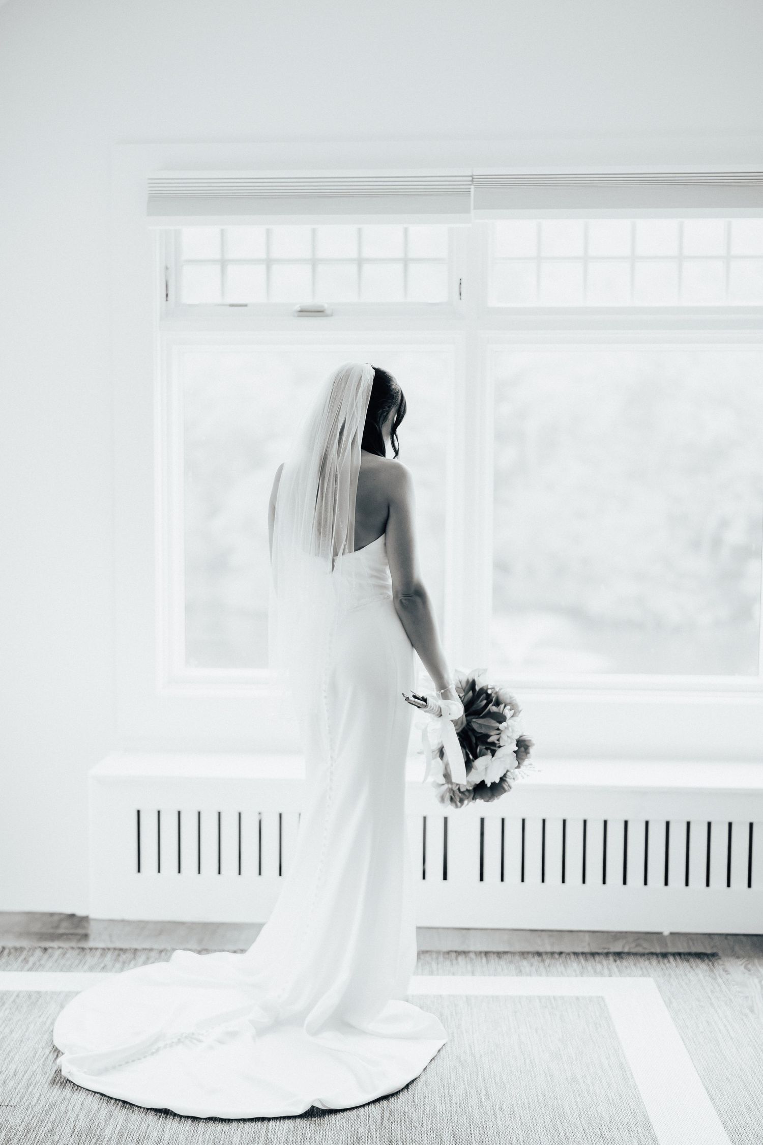 A series of ethereal bridal portraits showing a flowing white wedding gown against a bright minimalist backdrop.