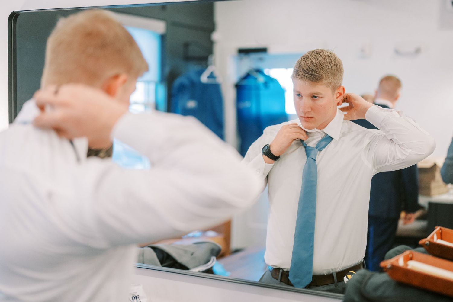 Scientists in lab coats conduct research and analysis in a modern laboratory setting.
