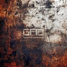 Textured rustic wall with weathered paint and rust patterns.