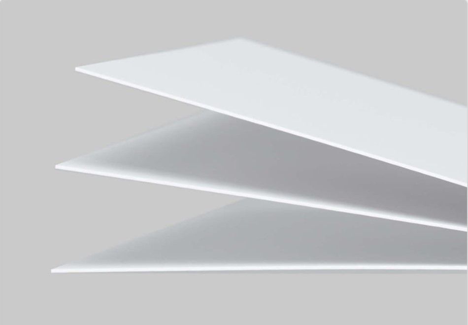 Side view comparison showing the thickness of 0.8 mm photo paper against a 0.3 mm sheet