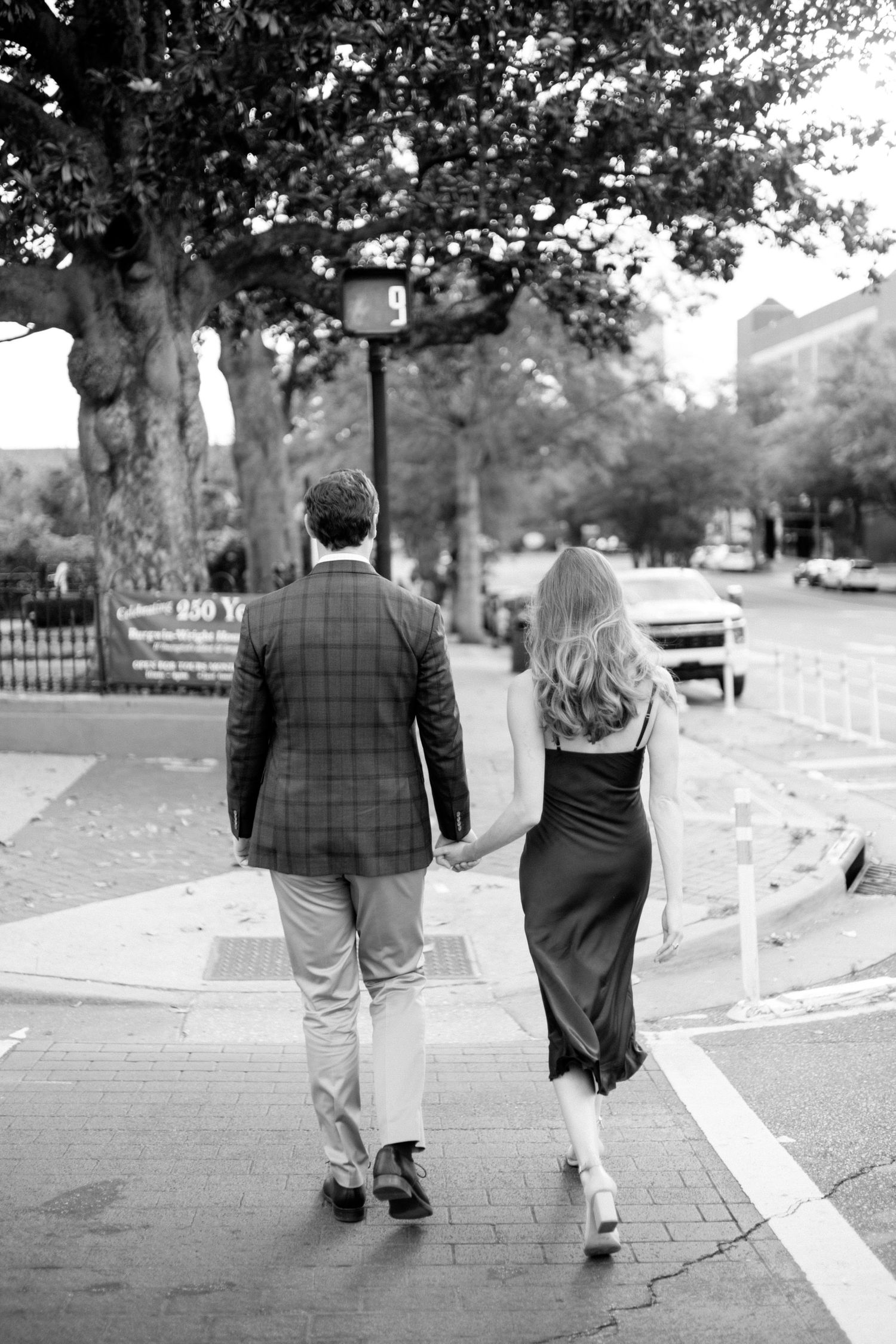 Black and white series shows a couple walking together down a tree-lined path from behind, with overlapping compositions.