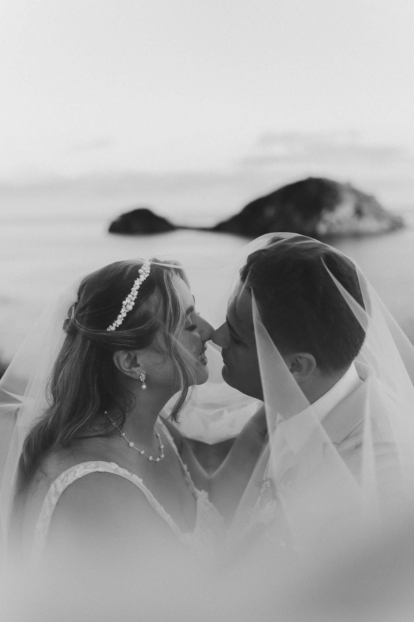 Romantic black and white wedding kiss montage showing multiple angles of the tender moment between newlyweds.