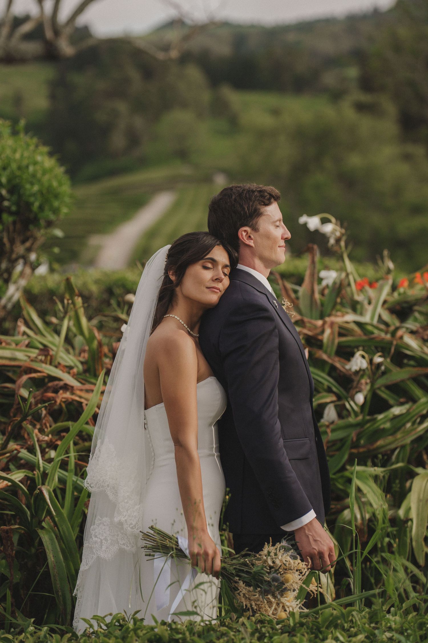 Bride and groom embrace in wild nature – Azores wedding photographer captures raw love
