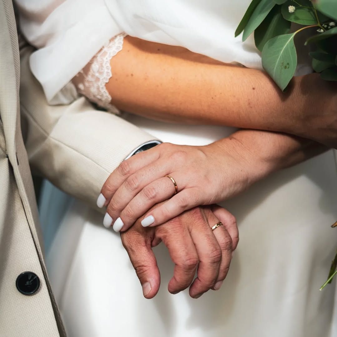 Close-up of wedding rings and hands – symbolic detail from São Miguel elopement
