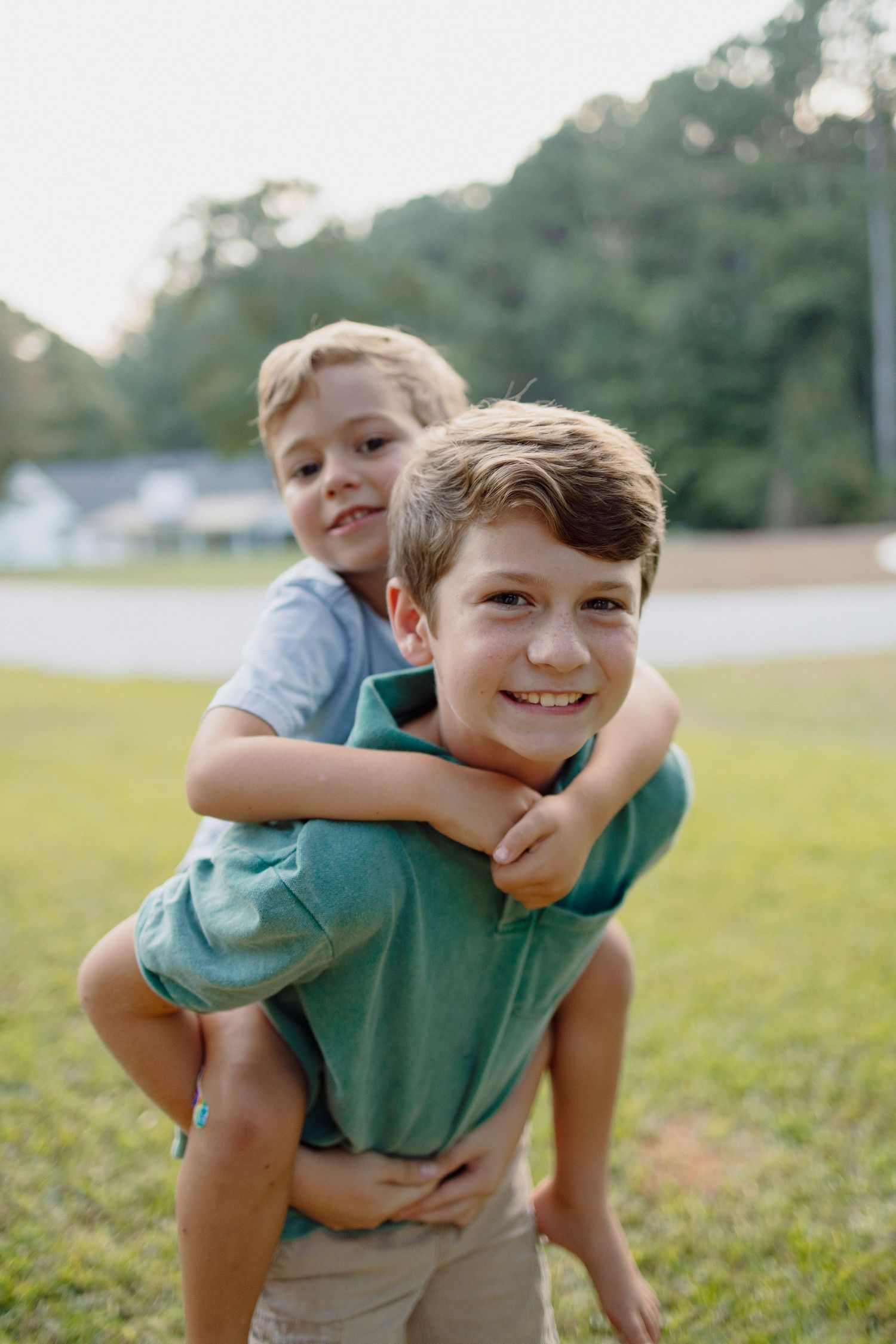 Brothers playing together in an outdoor photography session
