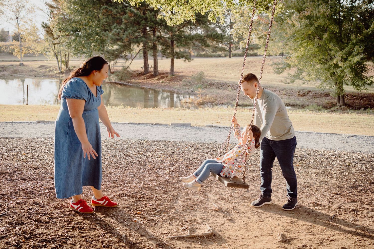 A series of photos shows someone walking their dog in a park on a sunny autumn day.