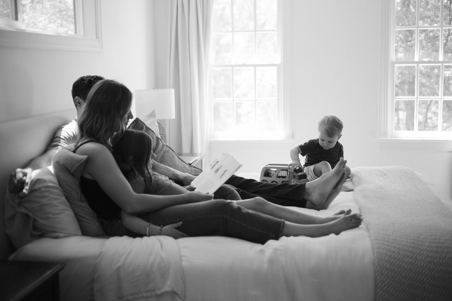 black and white, natural light documentary family photography by Meagan Conrad