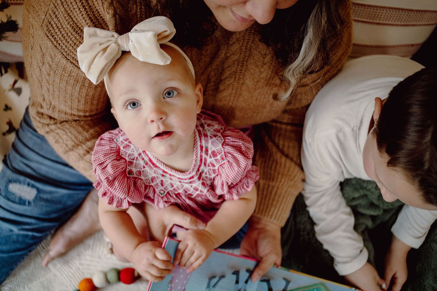 A collage of candid family moments showing children playing with toys and interacting with others.