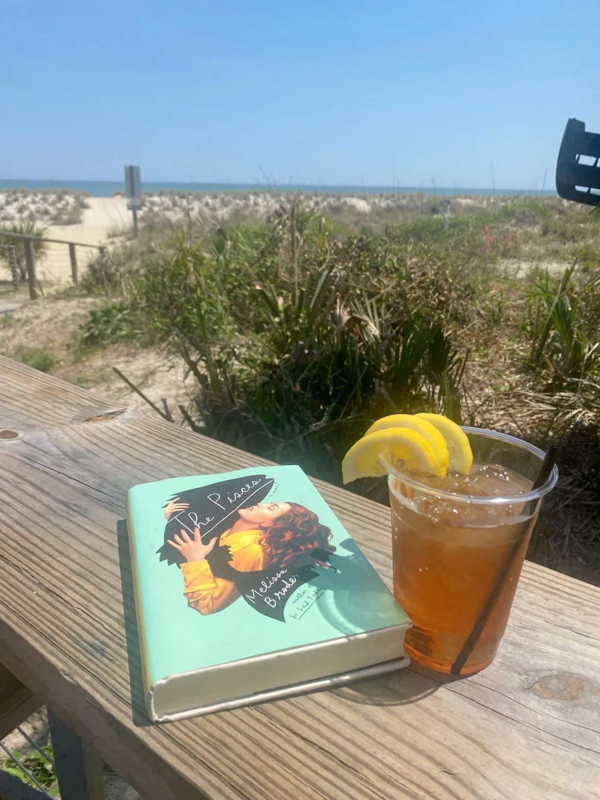 The Deck Beach Bar Tybee Island, GA, the best restaurants in Tybee with a beach view, outdoor patio. Top things to do in Tybee Island, GA