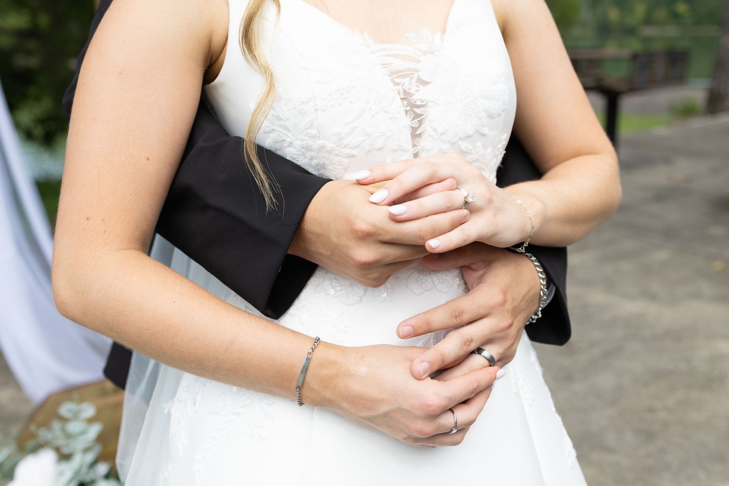 Wedding photo of couple and rings
