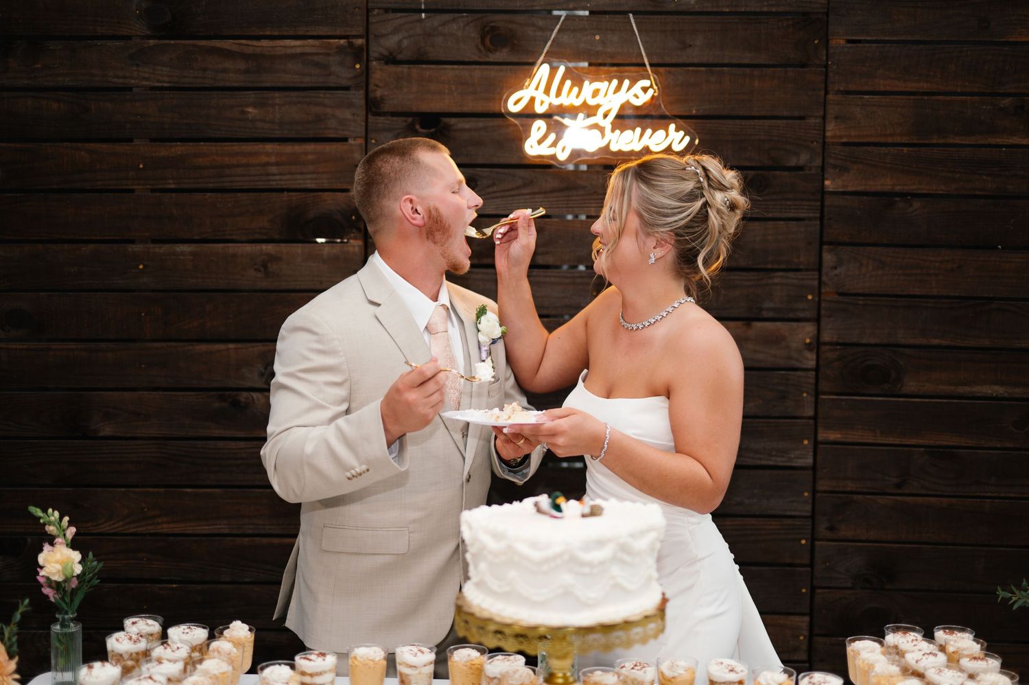 Wedding cake cutting at Arbor Haven in Fredericksburg, VA