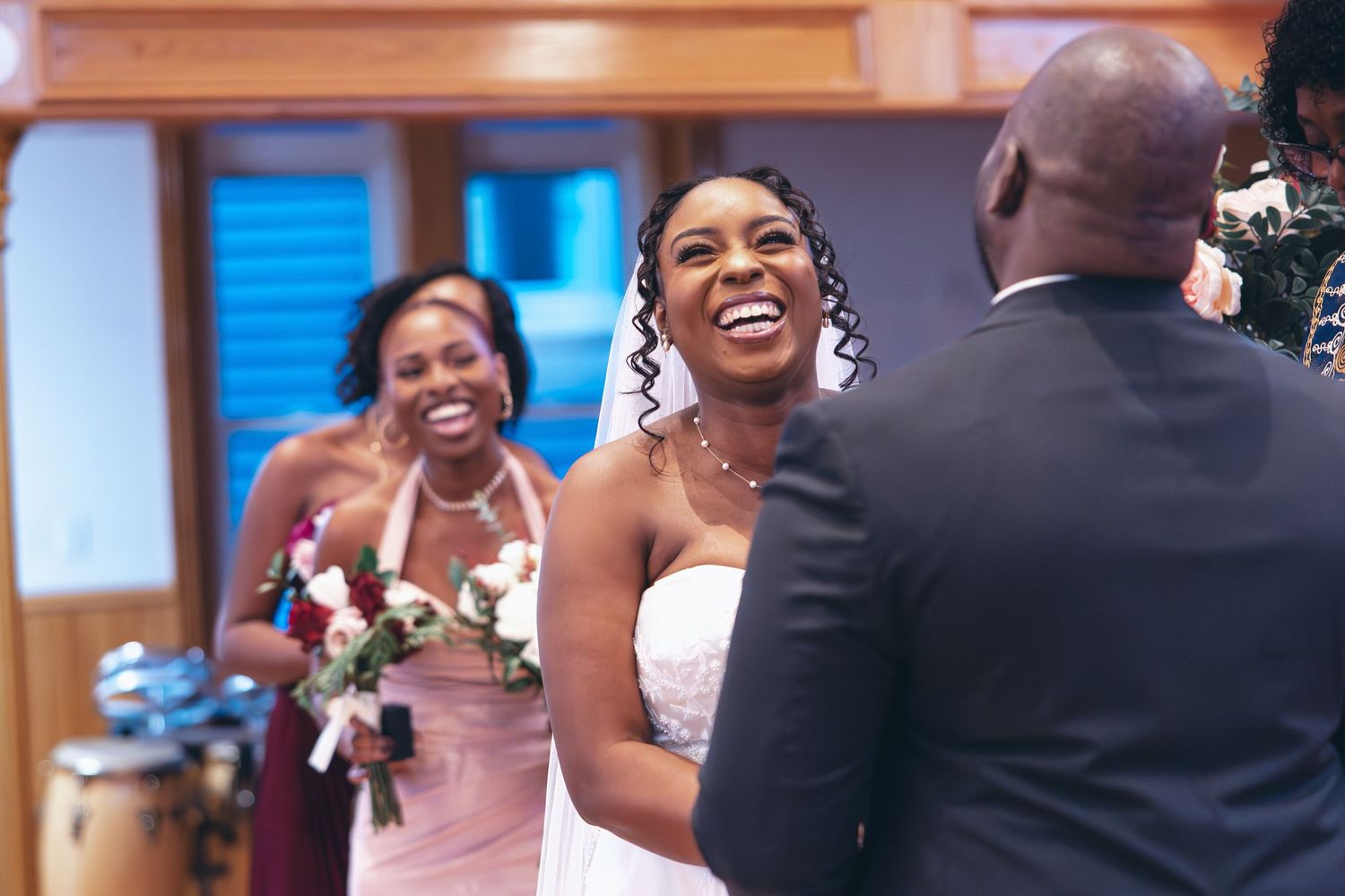 Bride and groom laughing during ceremony