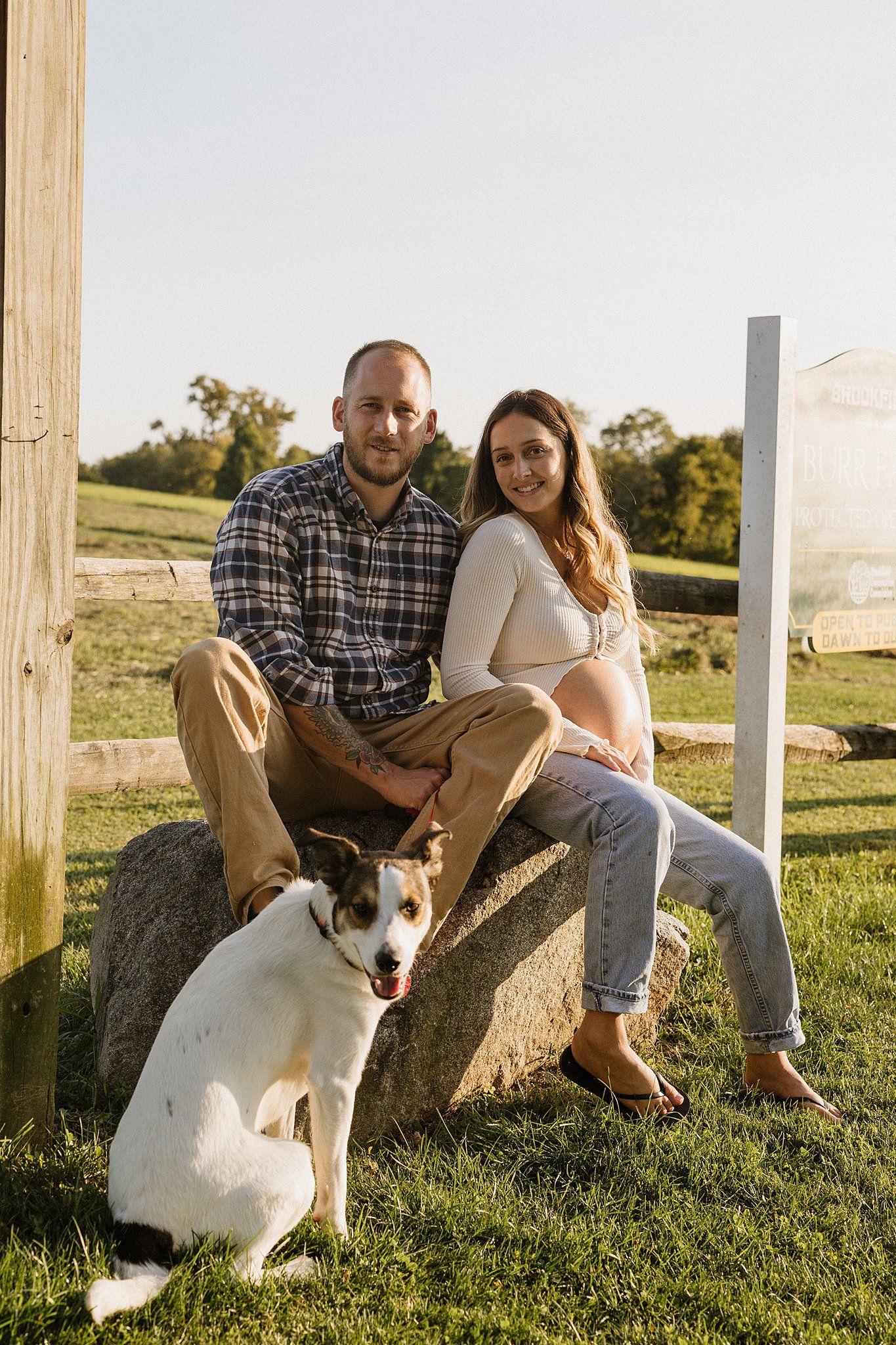 posed photo of parents to be in maternity session in connecticut