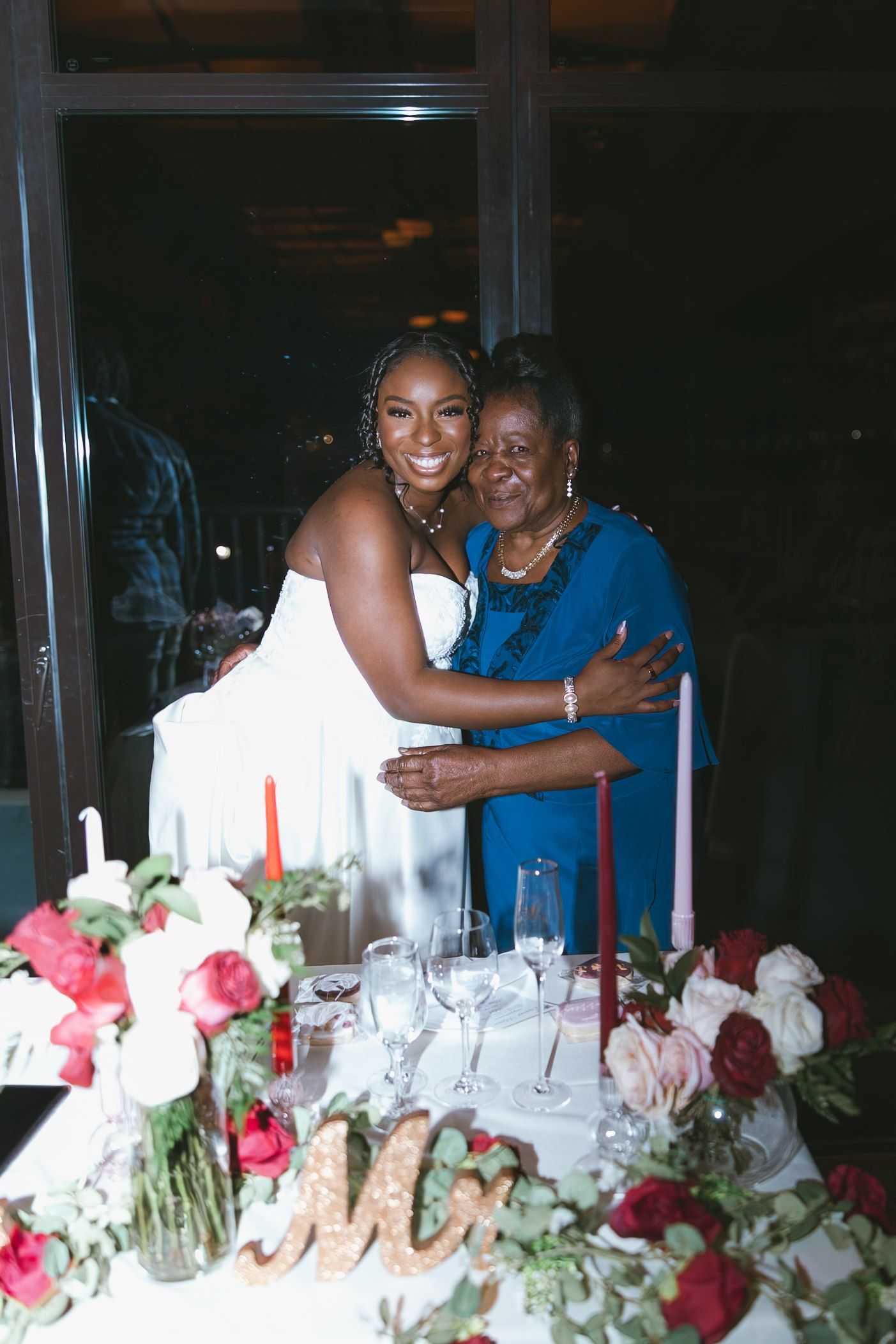 Bride and Mother In Law embracing during reception at Shadows on the Hudson