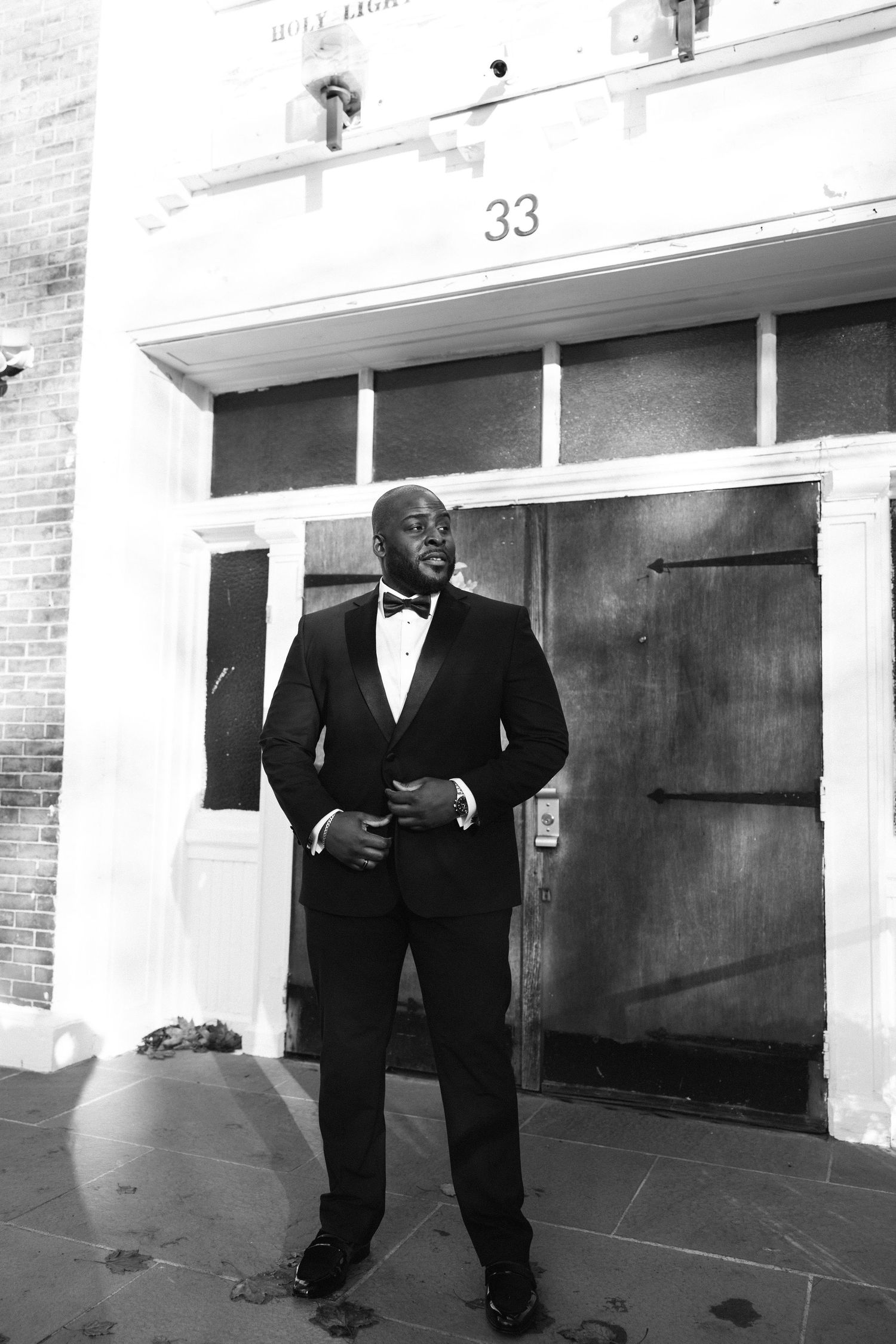 Groom portrait in front of church