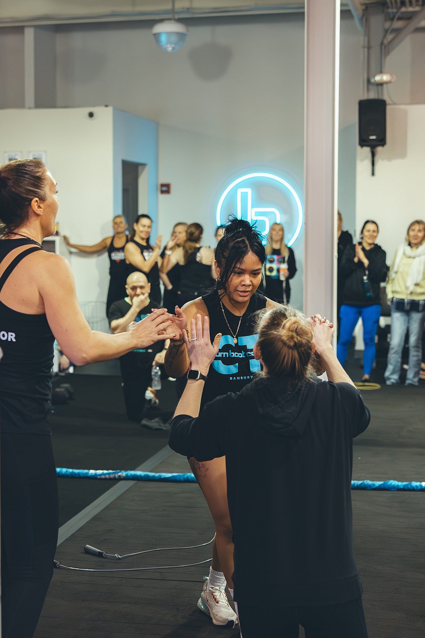 Member giving a high five after their heat