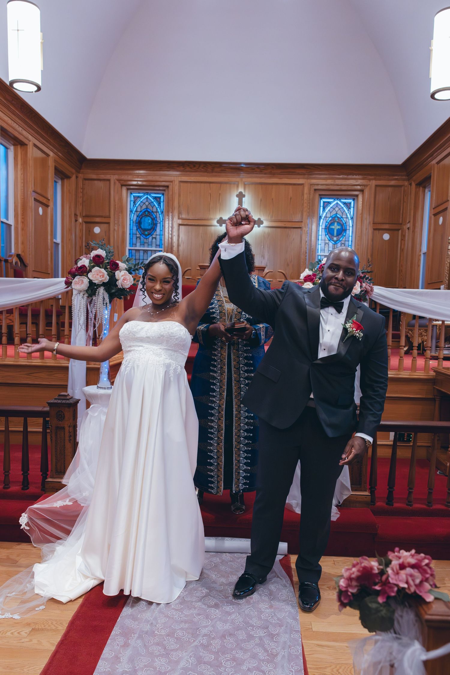 Bride and groom celebrating after first kiss