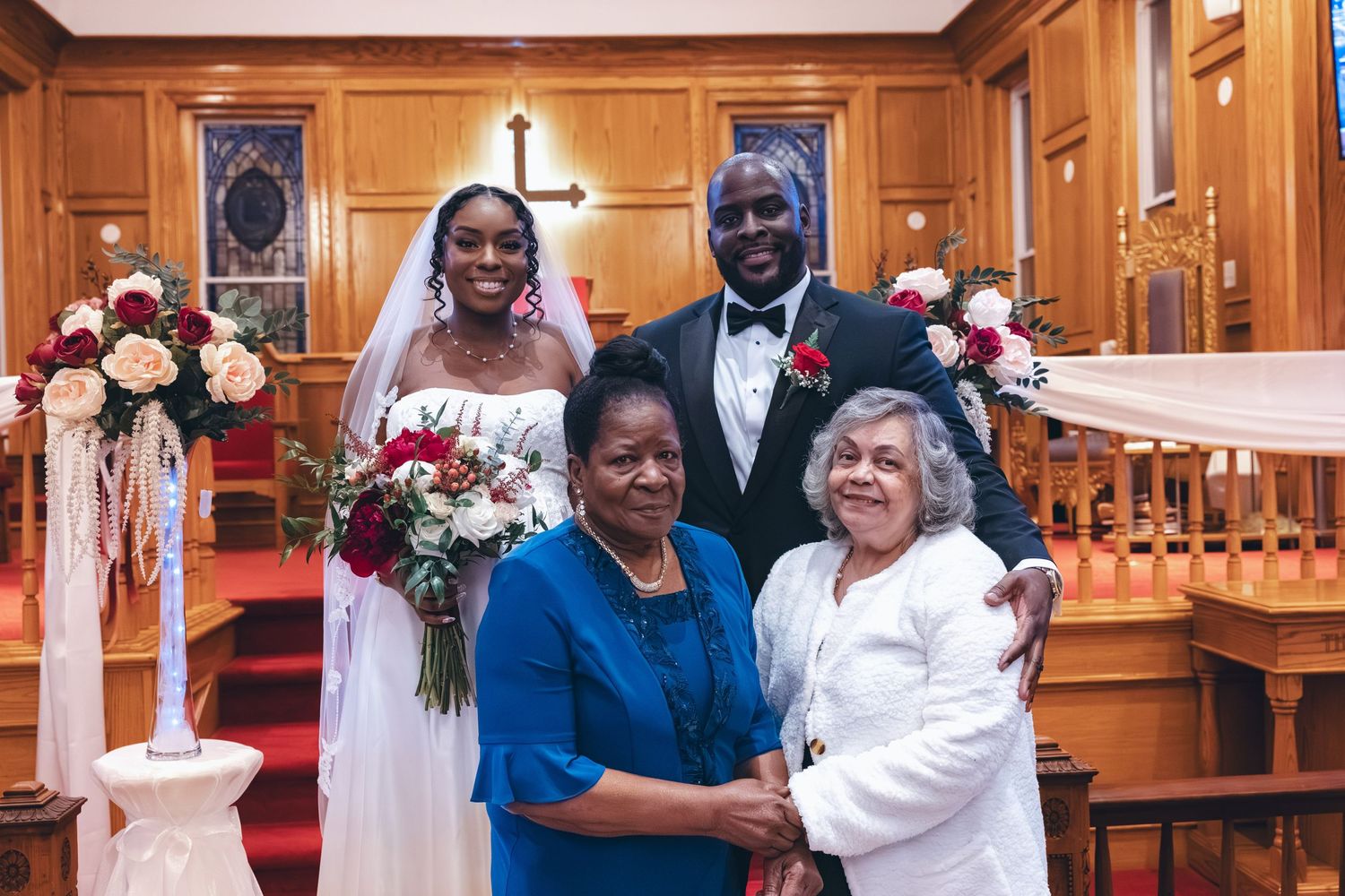 Bride and groom with mother and godmother
