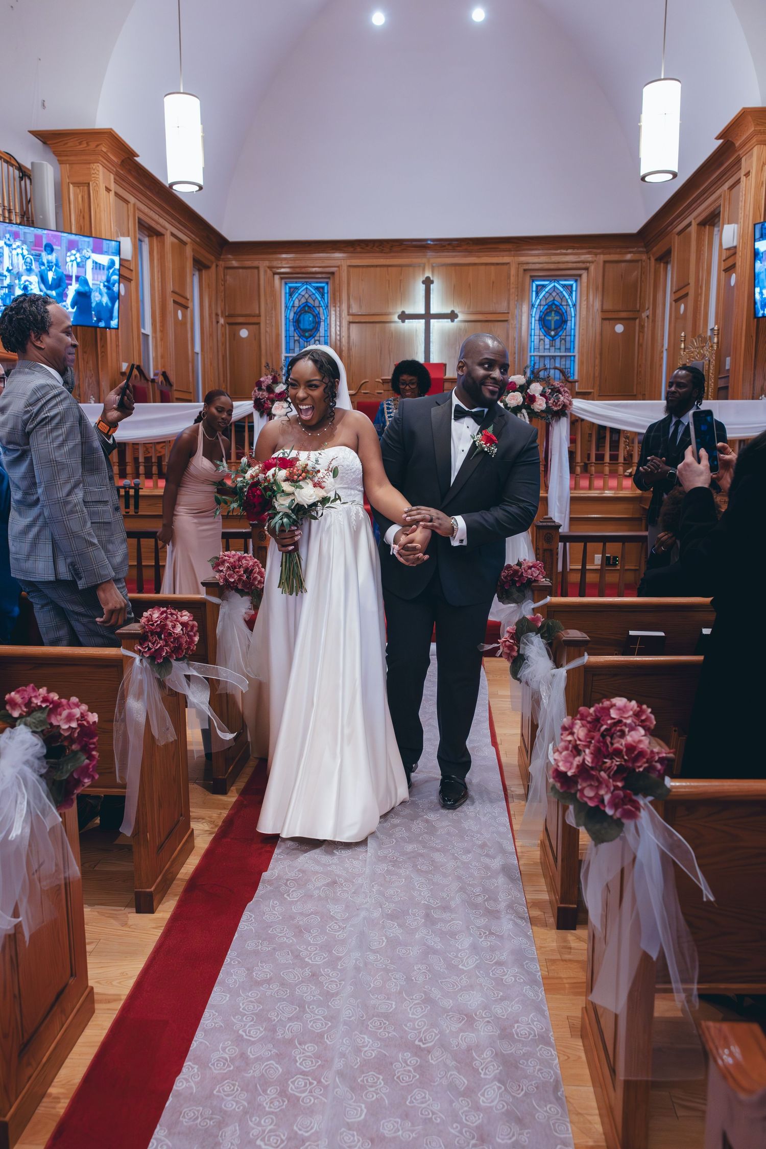 Bride and groom walking down the aisle