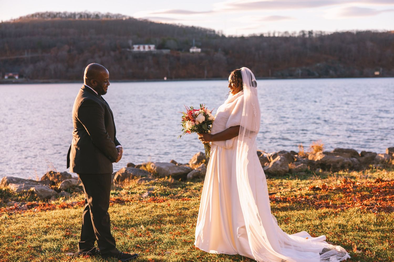 Bride and Groom during first look in front of Hudson Bridge