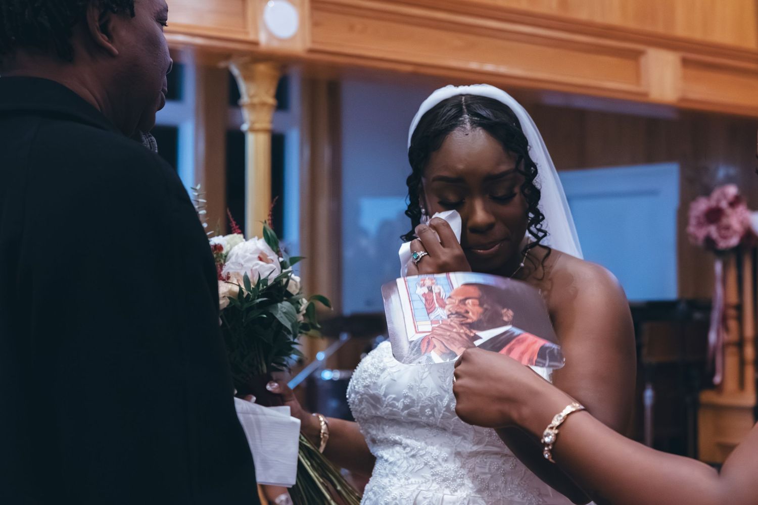 Bride emotional after her wedding ceremony at Holy Light Pentecostal Church