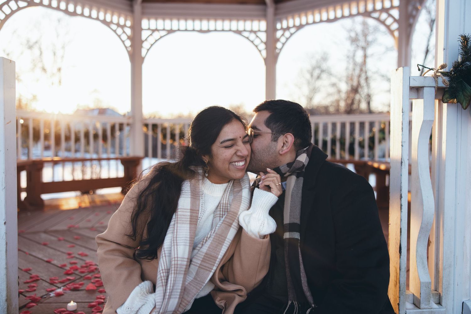 Man kissing his bride to be