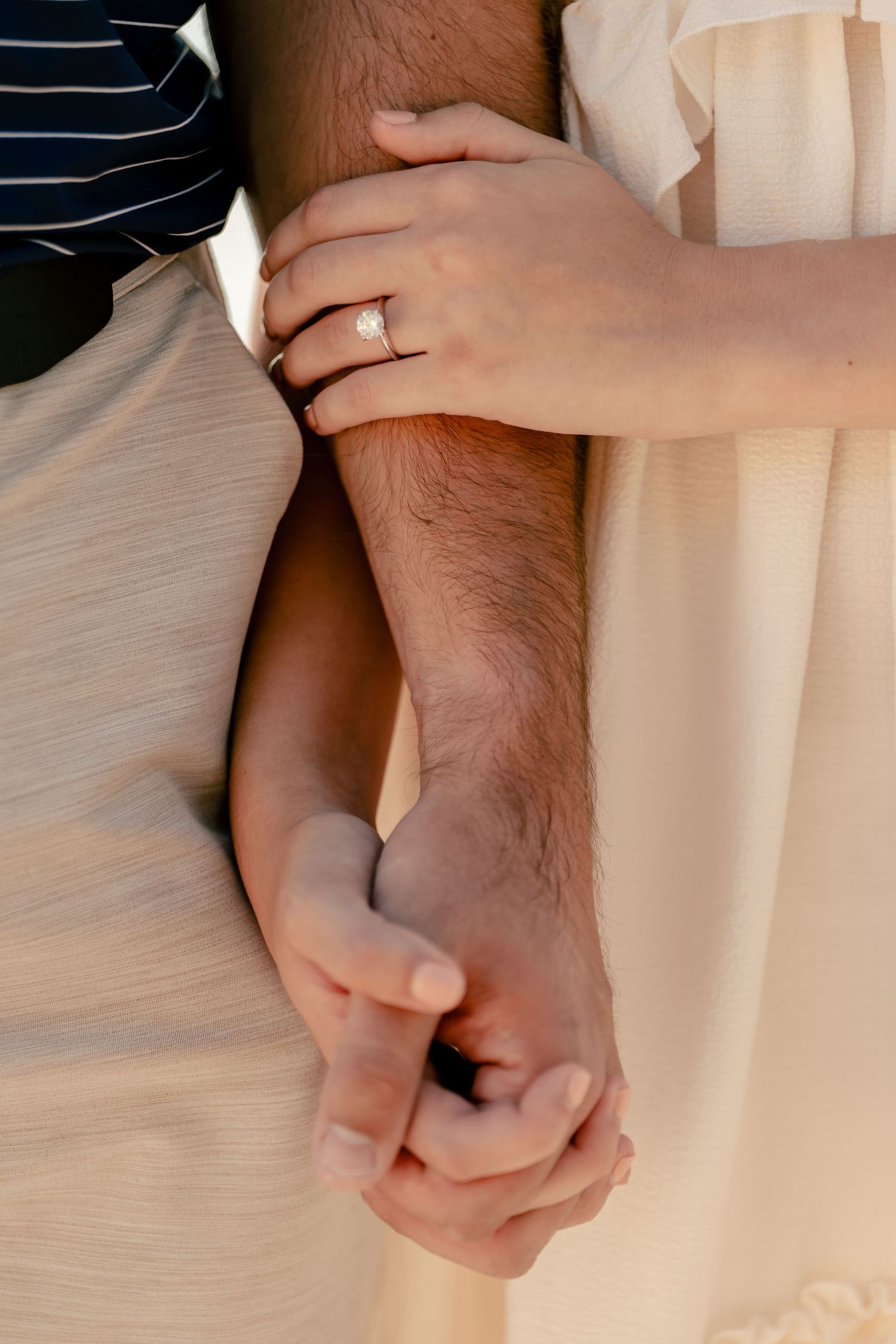 Series of intimate hand-holding moments captured in natural light.