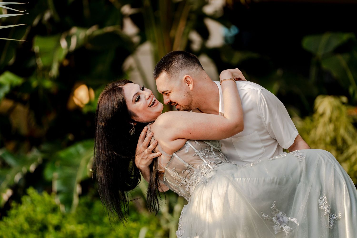 Intimate garden photoshoot with natural lighting and greenery.