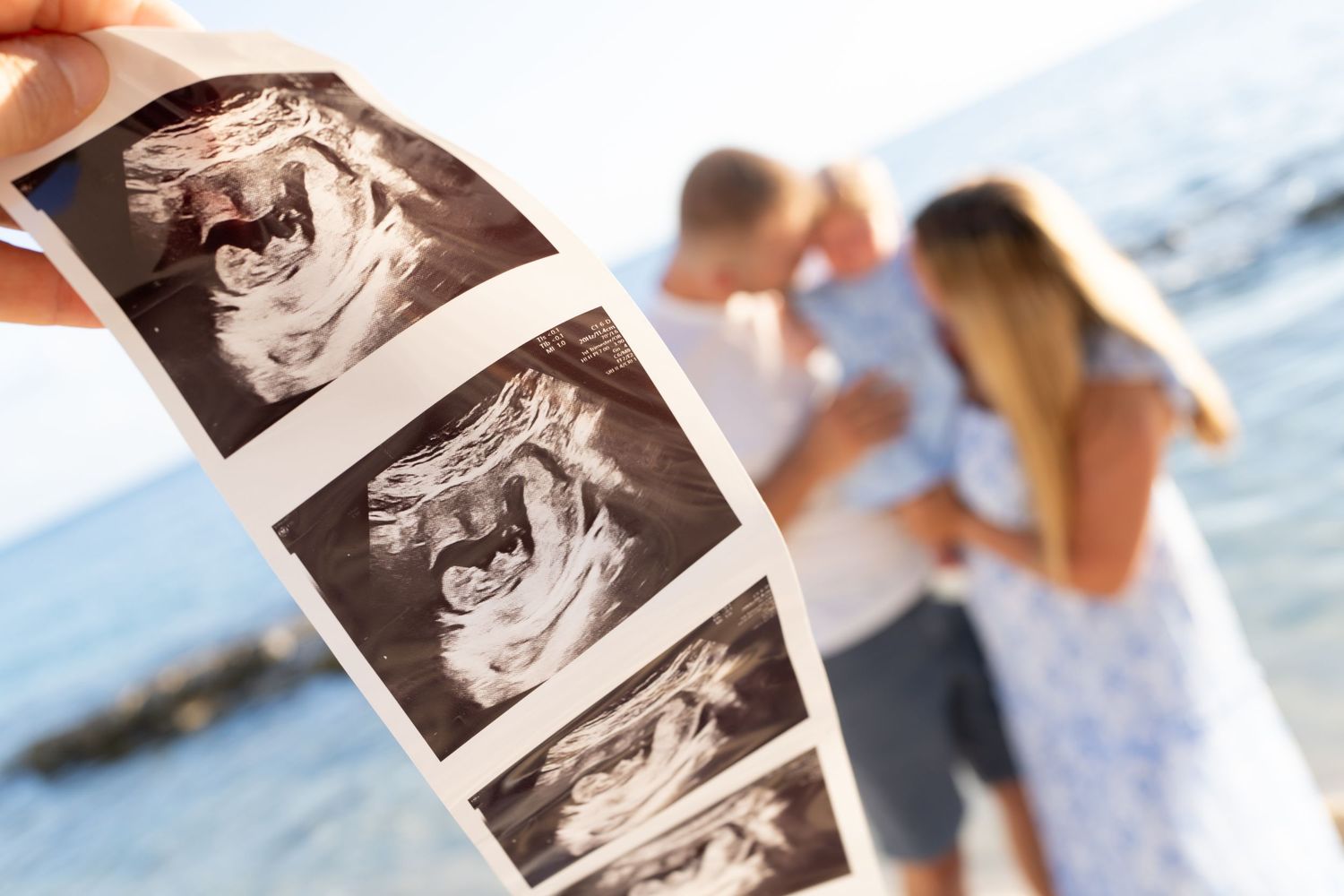 Collection of ultrasound images displayed alongside a beach scene.