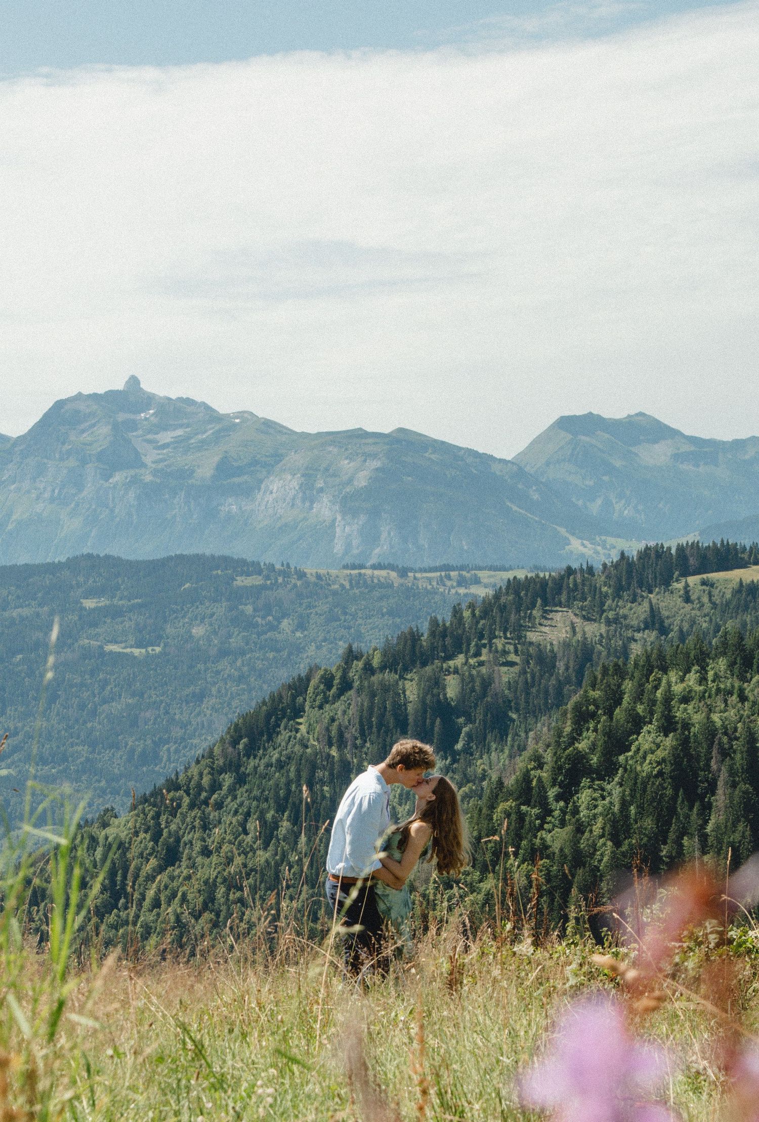 Engagement photos taken by documentary style wedding photographer in Morzine, France. French Wedding Venue. Wedding photography inspiration.