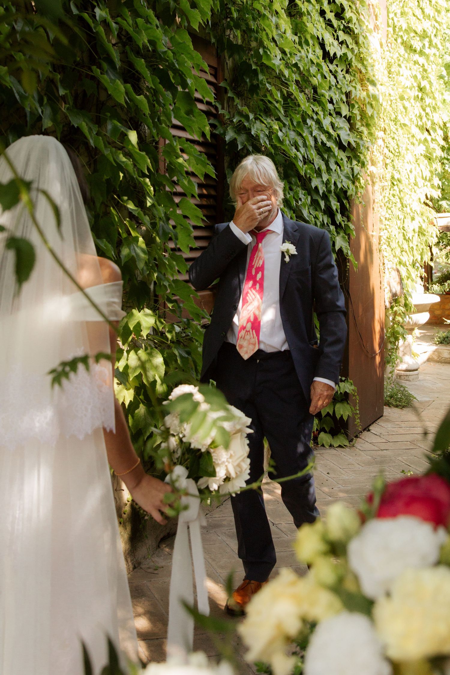 Assisi Wedding ceremony in Italy captured by destination wedding photographer, candid, natural style. Documentary style wedding photography.