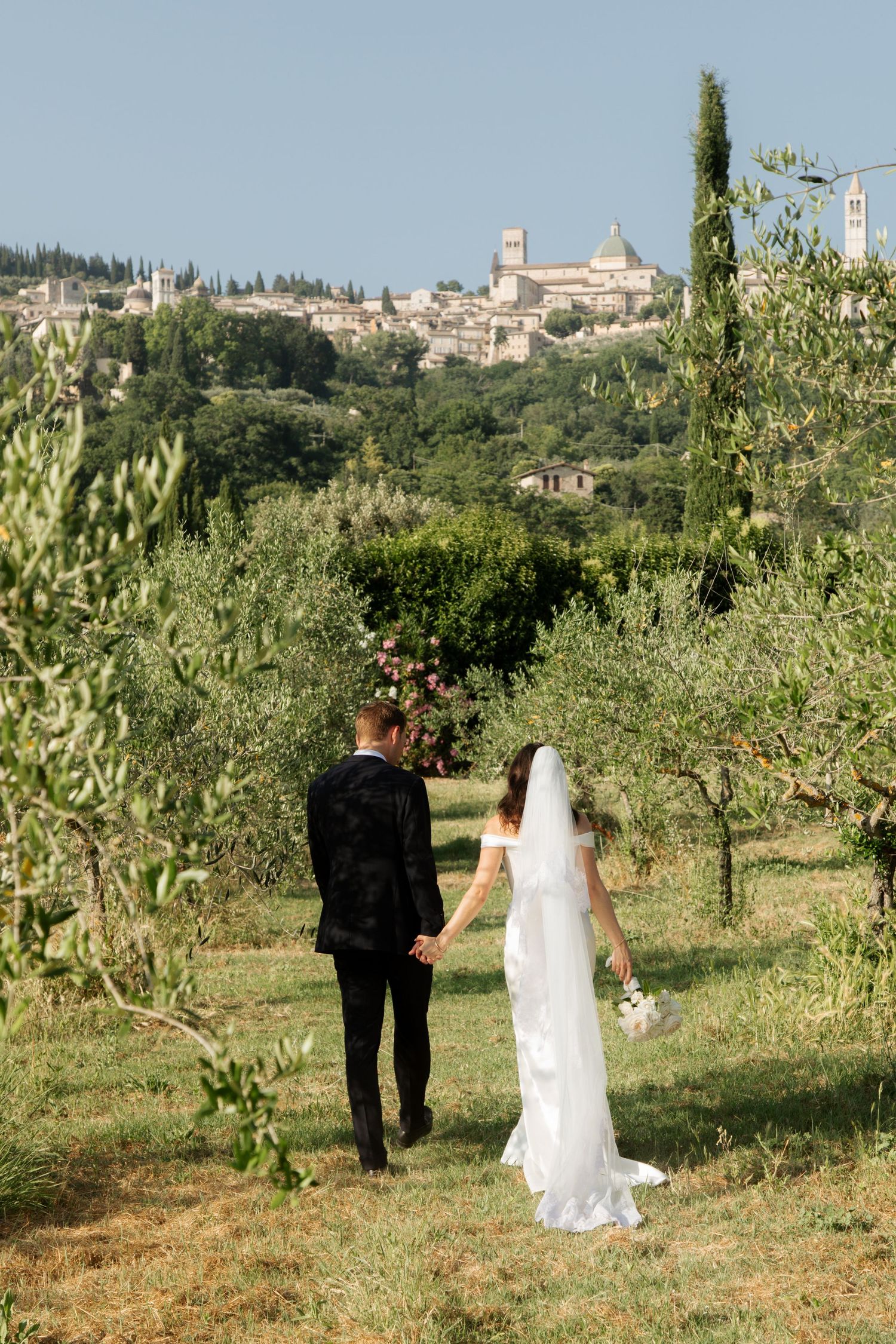 Italian Wedding photos in Assisi captured by destination wedding photographer, candid, natural style. Documentary style wedding photography.
