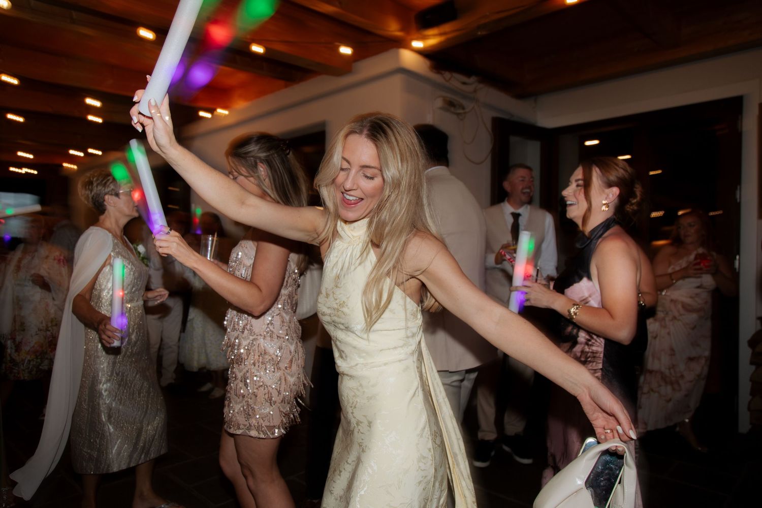 Morzine Wedding photographer captures flash photos of wedding party at Montriond Wedding Venue, Lake Montriond.Candid timeless documentary