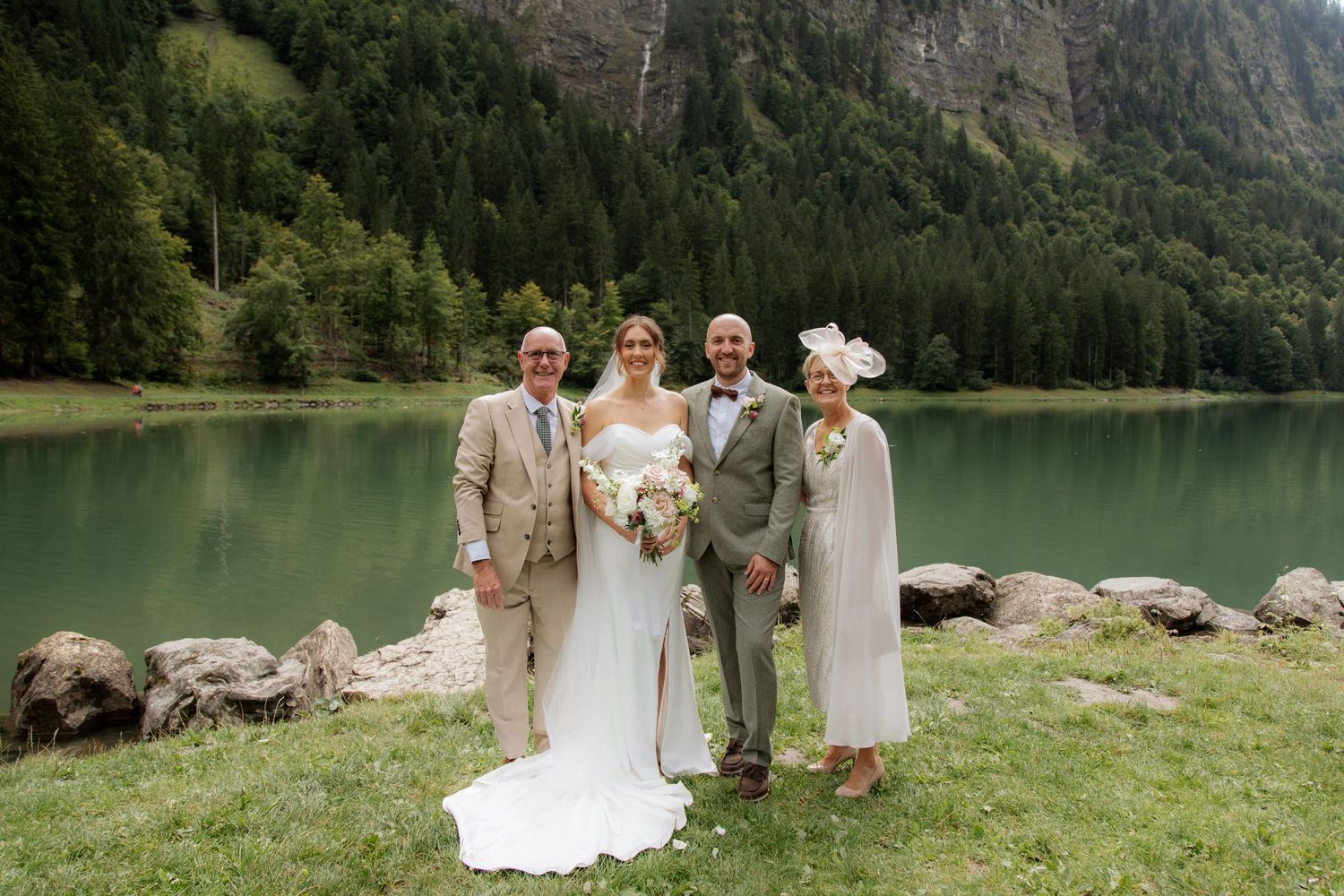 Morzine Wedding photographer captures intimate wedding cermeony photos on Lac Montriond. Candid timeless documentary style photography.