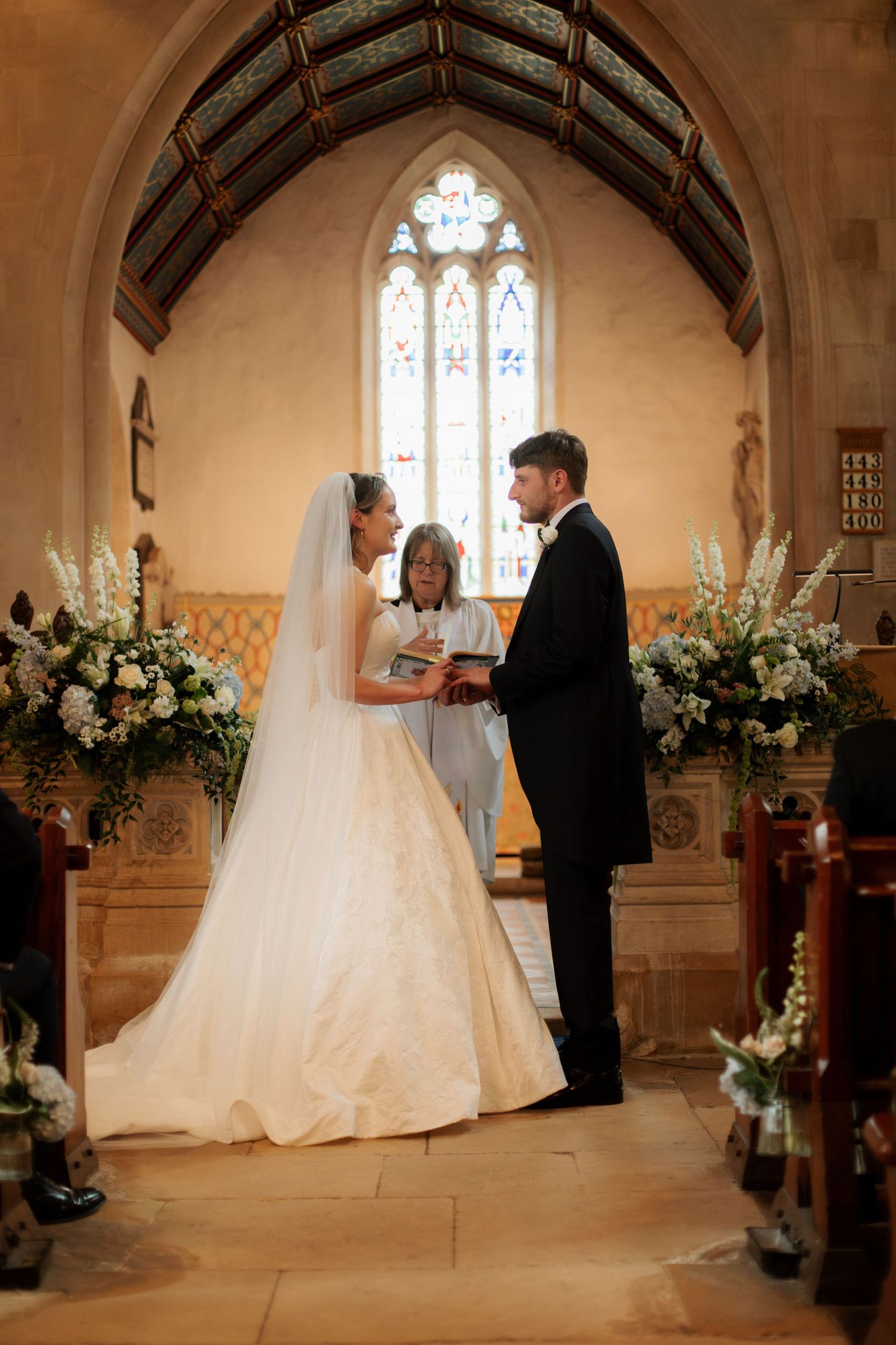 Documentary Style Cotswold Wedding Photographer captures wedding confetti at Gloucestershire Wedding Venue.Natural,candid and timeless photo