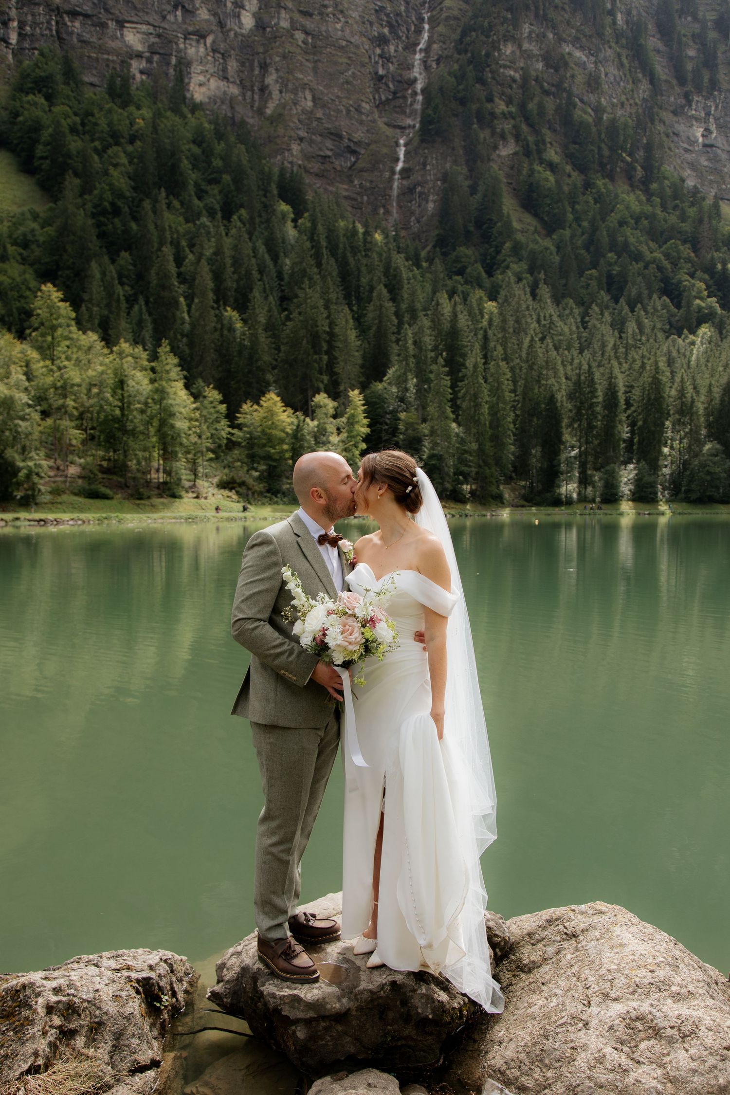 Morzine Wedding photographer captures intimate wedding cermeony photos on Lac Montriond. Candid timeless documentary style photography.