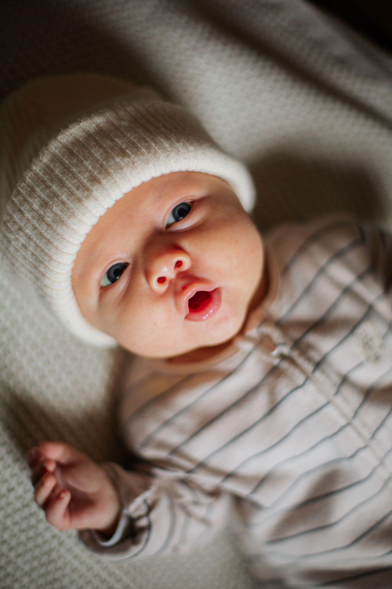 Newborn Photographer captures maternity photos of mother and baby. Newborn photography session captured by Morzine newborn Photographer
