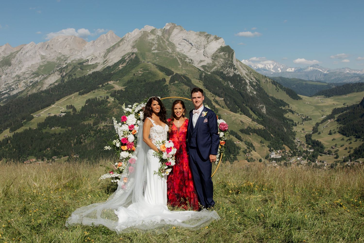 Morzine Wedding Photographer captures wedding ceremony photo at La Clusaz Wedding venue. French Mountain Wedding photographer. Outdoor Bride