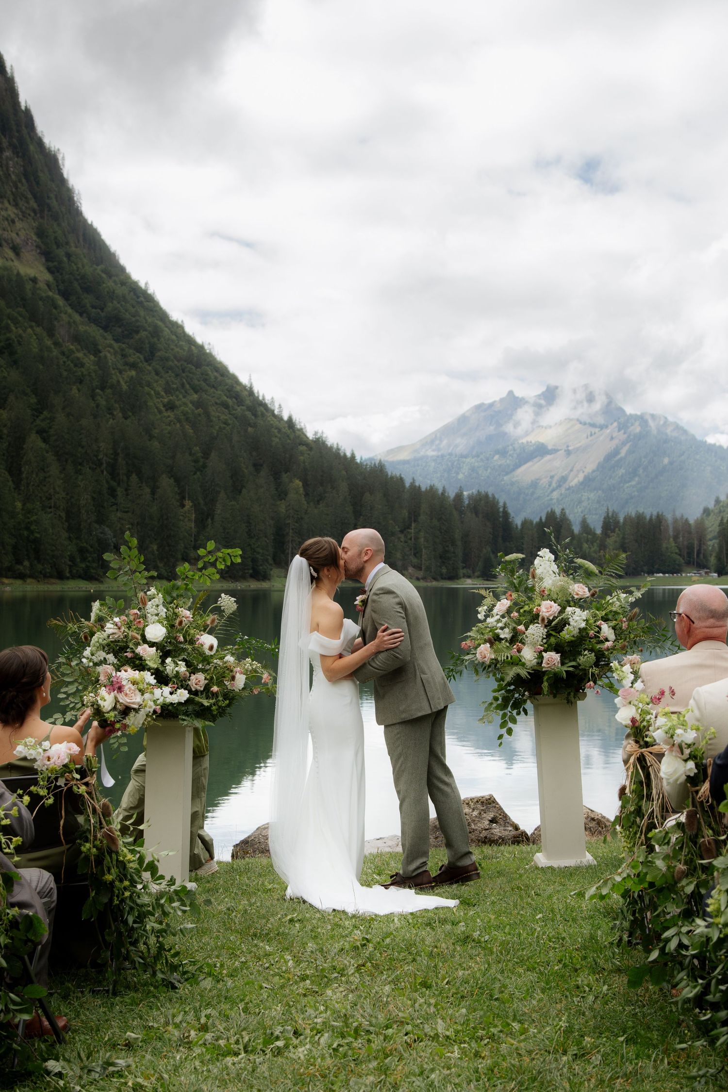 Morzine Wedding photographer captures intimate wedding cermeony photos on Lac Montriond. Candid timeless documentary style photography.