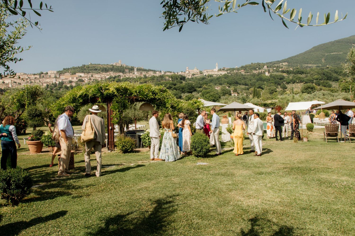 Assisi Wedding ceremony in Italy captured by destination wedding photographer, candid, natural style. Documentary style wedding photography.
