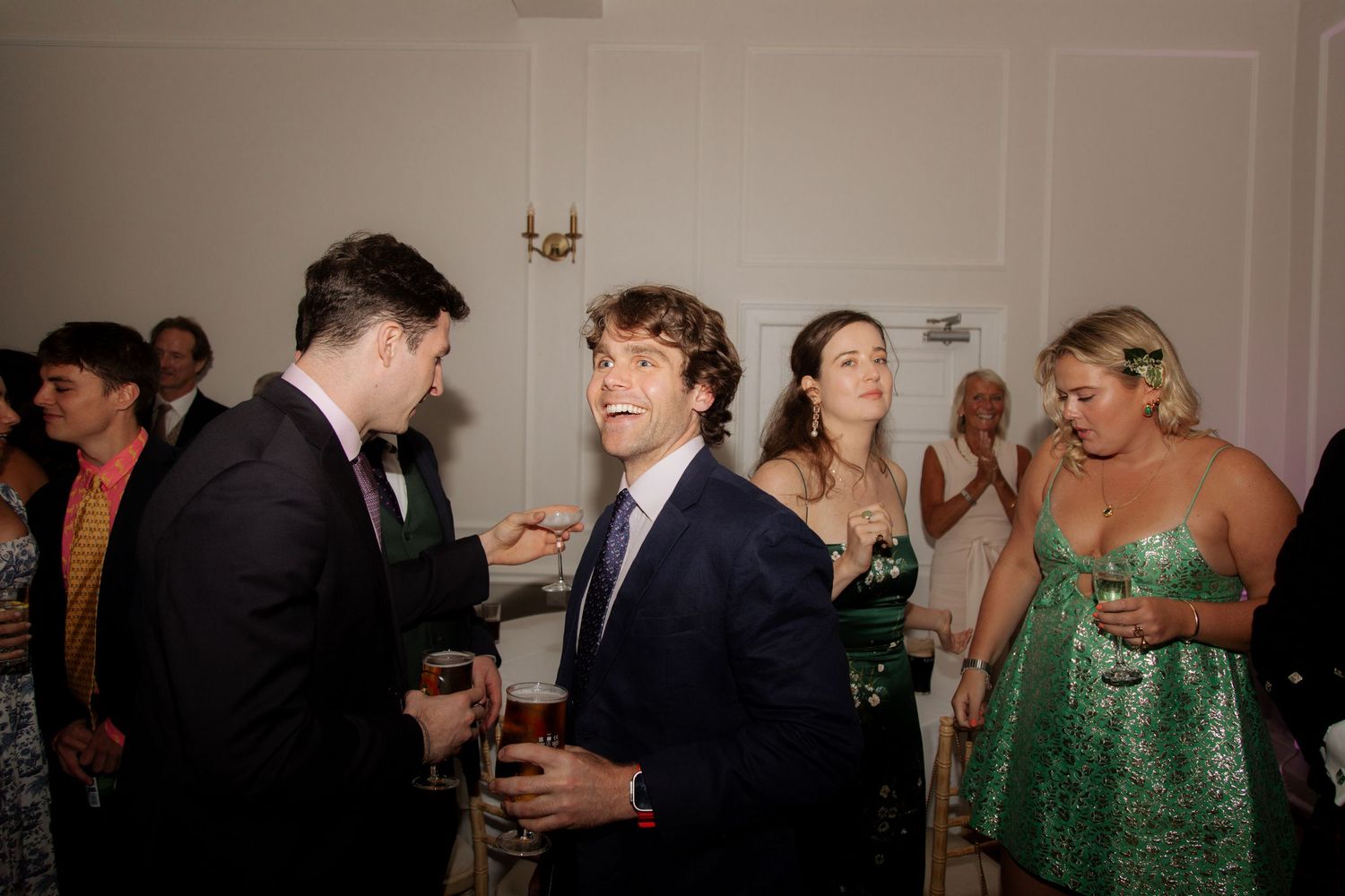 Documentary Style Cotswold Wedding Photographer captures wedding party at a Gloucestershire Wedding Venue. natural and candid wedding photos